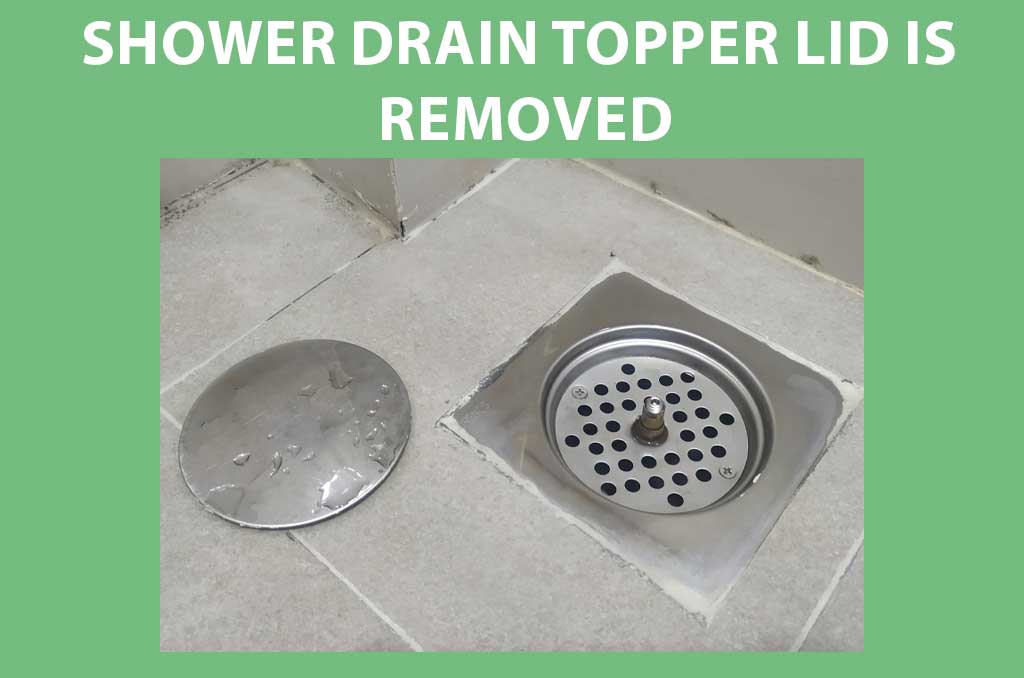 The shower drain topper lid is removed