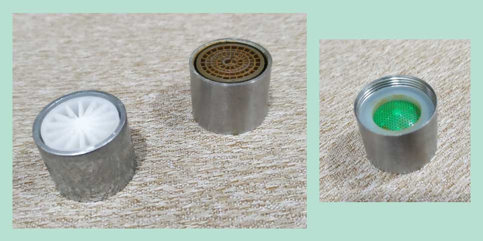 Two faucet aerators and the inside of a aerator