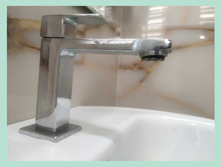 A faucet with attached cache aerator